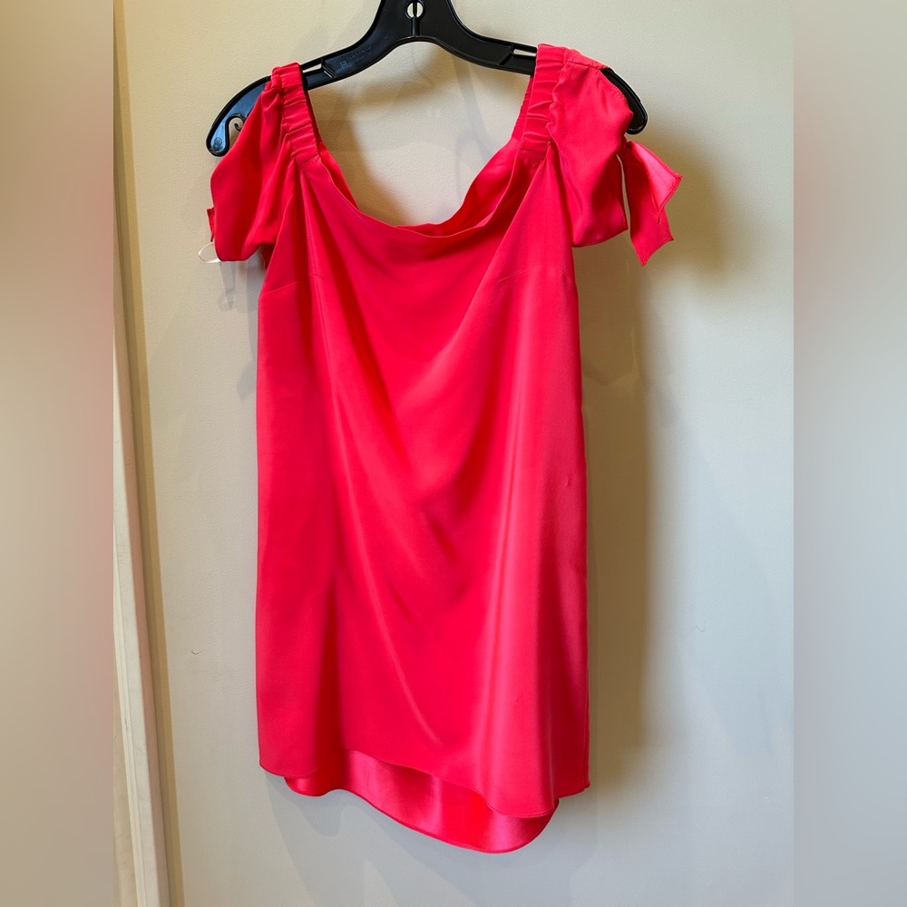 Women’s short red silk dress.